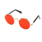 Pet sunglasses with round red tinted lenses and rose-gold metal frames