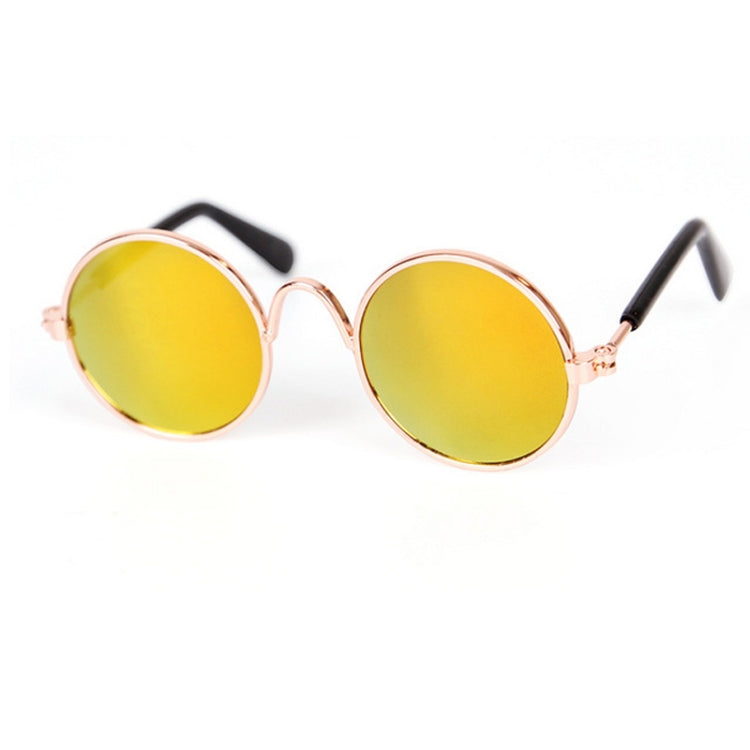 Pet sunglasses with round yellow tinted lenses and rose-gold metal frames