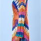 Crochet tunic dress back view, multicolor hollow-knit pattern and long fringe trim
