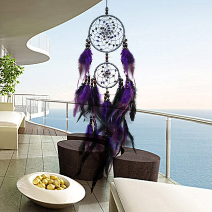 Purple feather dream catcher wall hanging with two beaded hoops and dangling feathers