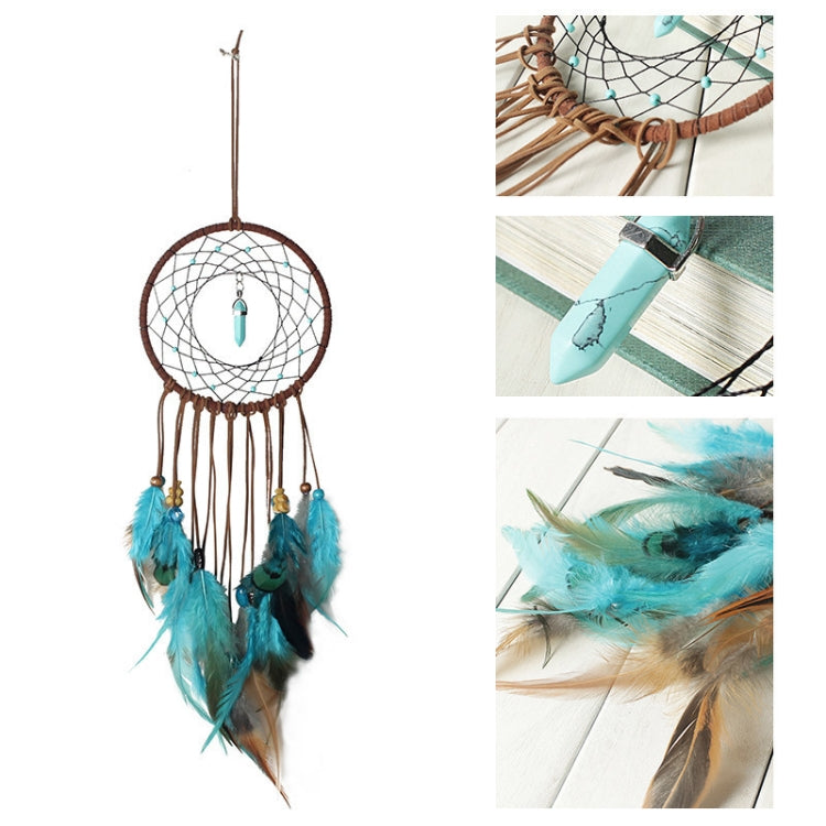 Dreamcatcher wall hanging with brown ring, white net, turquoise feather fringe and teal charm