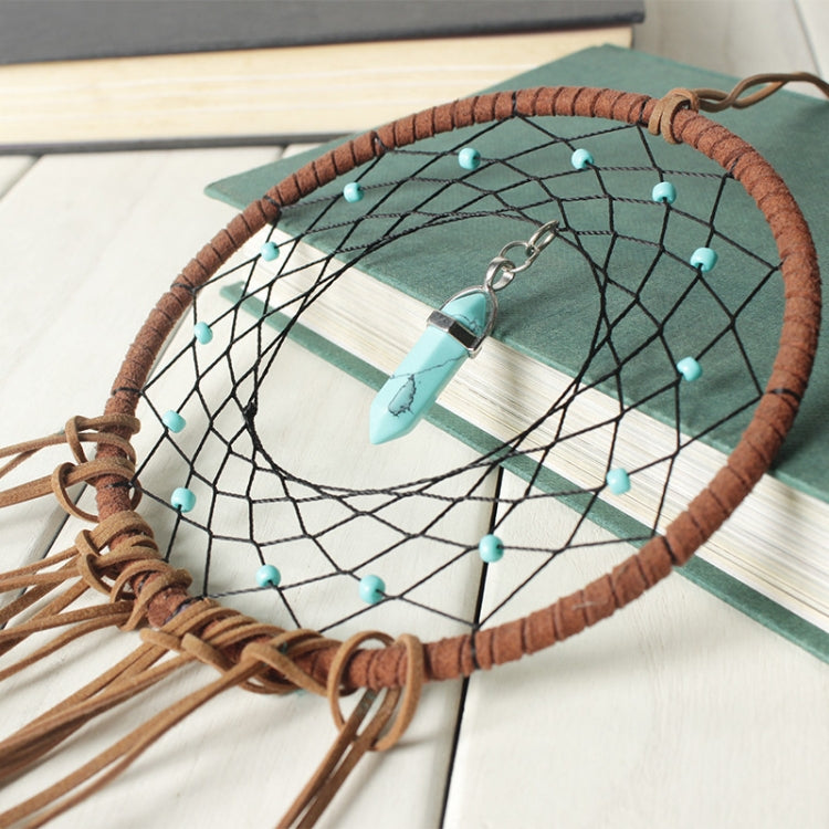 Dreamcatcher web detail with turquoise beads, teal crystal charm, brown braided hoop