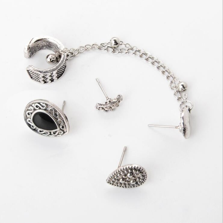 Silver-tone mixed charm earrings set: oval drop, heart stud, and ear cuff chain