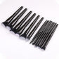 Assorted makeup brush set with soft black bristles, black handles, and fine liner brushes