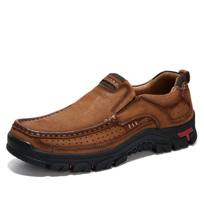 Brown suede hiking sneaker with perforated upper and rugged rubber sole