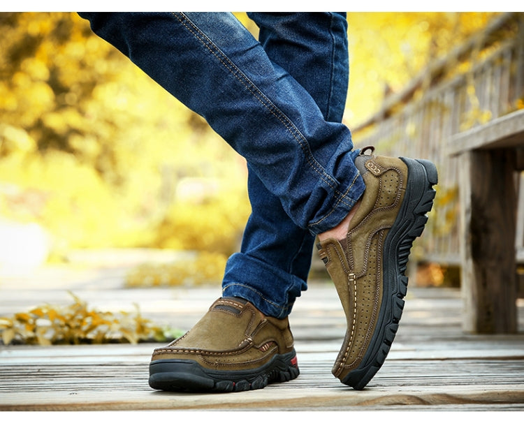 Brown suede hiking sneakers with high-traction rubber sole and side eyelets
