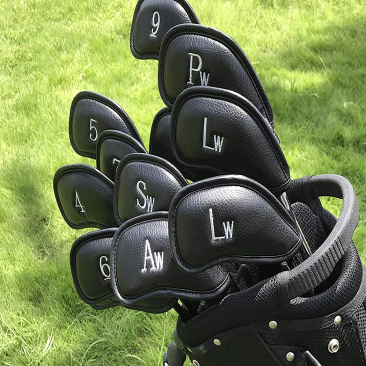 Black textured golf club head covers on a bag, numbered caps for club protection.