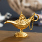 Gold metal wish lamp with decorative genie lamp spout and dangling chain