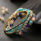 Multi-layer beaded elastic bracelet with turquoise, gold, navy, and purple beads