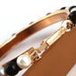 Girls hoop pearl earrings clasp detail with black and white beads on gold hoop