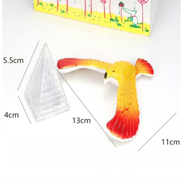 Eagle balance bird toy with clear triangular base; size indicators show 13cm and 11cm
