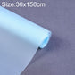 Light blue waterproof drawer pad mat roll with textured surface and cut-off edge