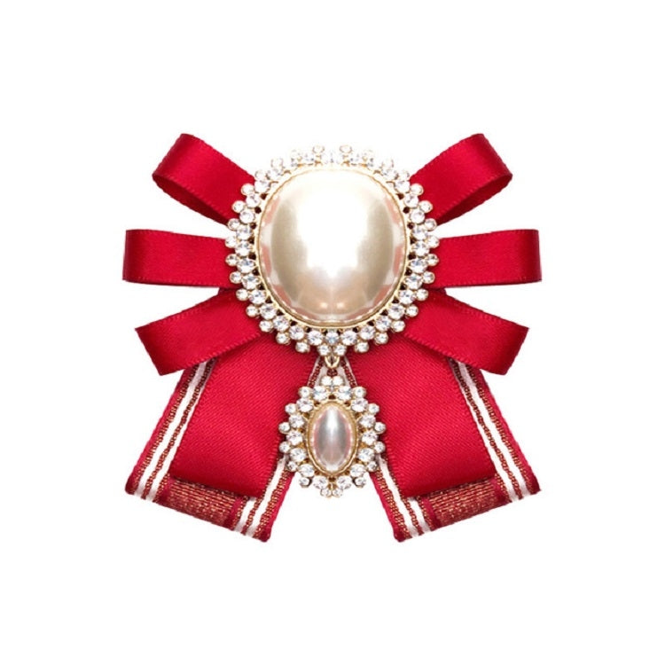 Red satin bow brooch with oval pearl cabochon and rhinestone border, double pearl detail