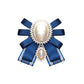 Blue ribbon pearl bow with oval center faux pearl and small drop, embellished with rhinestones
