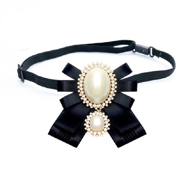 Black belt accessory with bow brooch: oval pearl center, small pearl drop, rhinestone trim