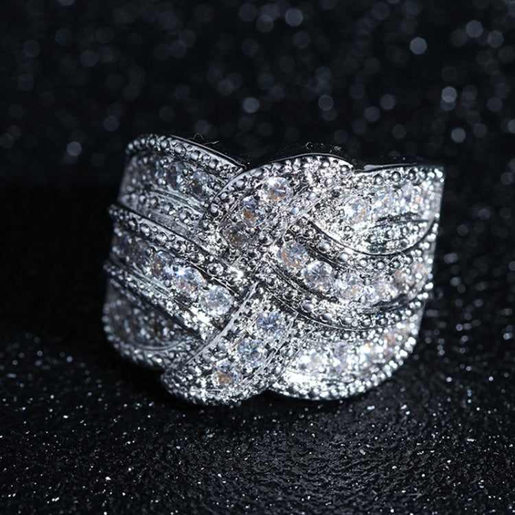 Glittering silver zircon wide band ring with swirling layered design