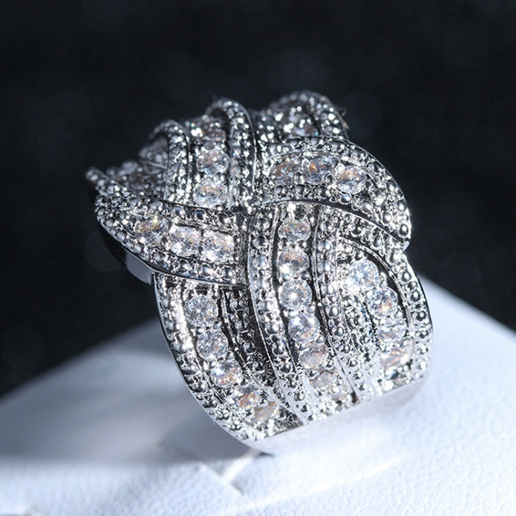Silver-toned zircon wide cuff-style ring with detailed pave pattern