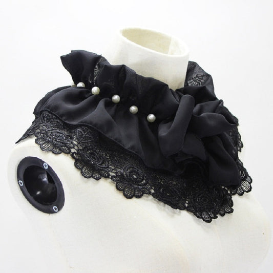 Black faux polo collar with lace hem, chiffon ruffles, and pearl button details