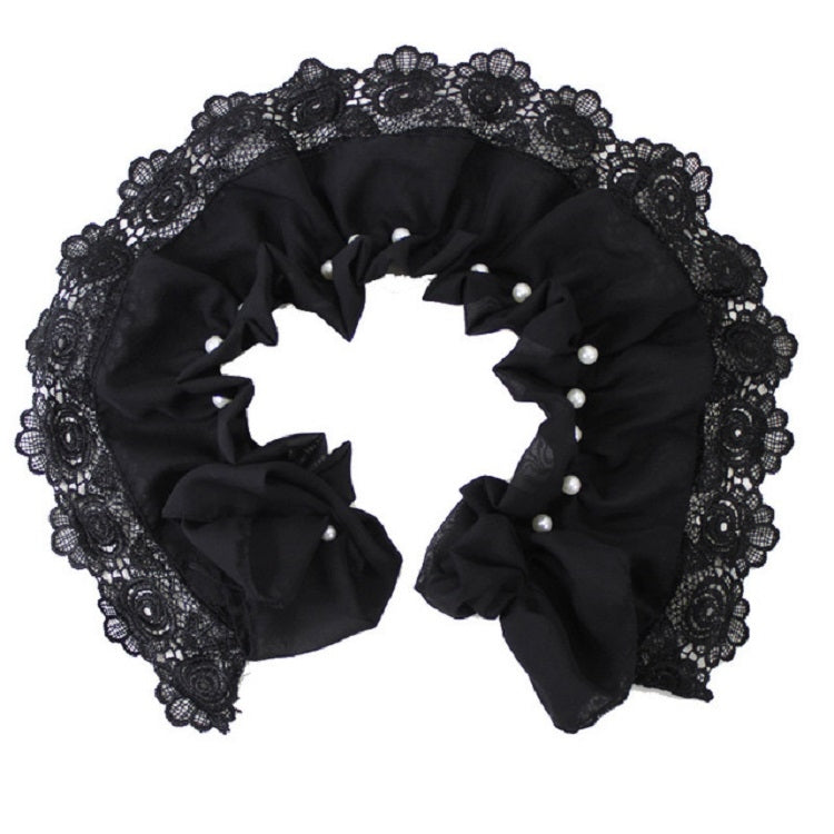 Black lace-edged faux collar close-up with ruffled center and pearl bead accents