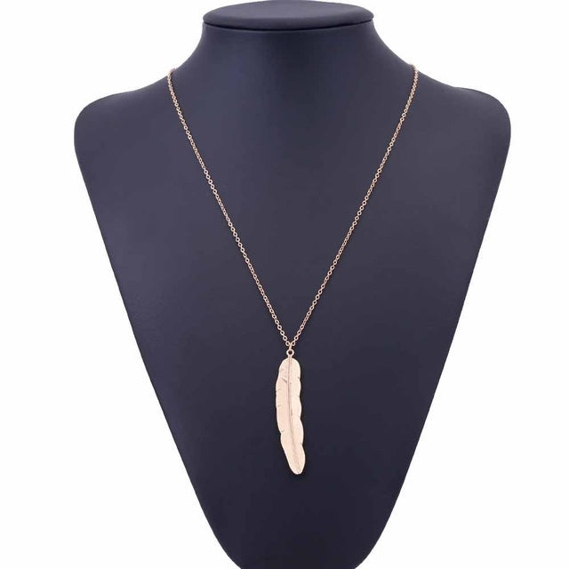 Gold long feather pendant necklace with thin chain