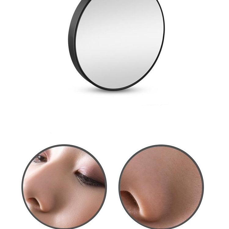 Round black suction cup makeup mirror with reflective lens and magnified face insets