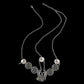 Silver multi-strand head chain with dangling round coin charms and central paisley drop