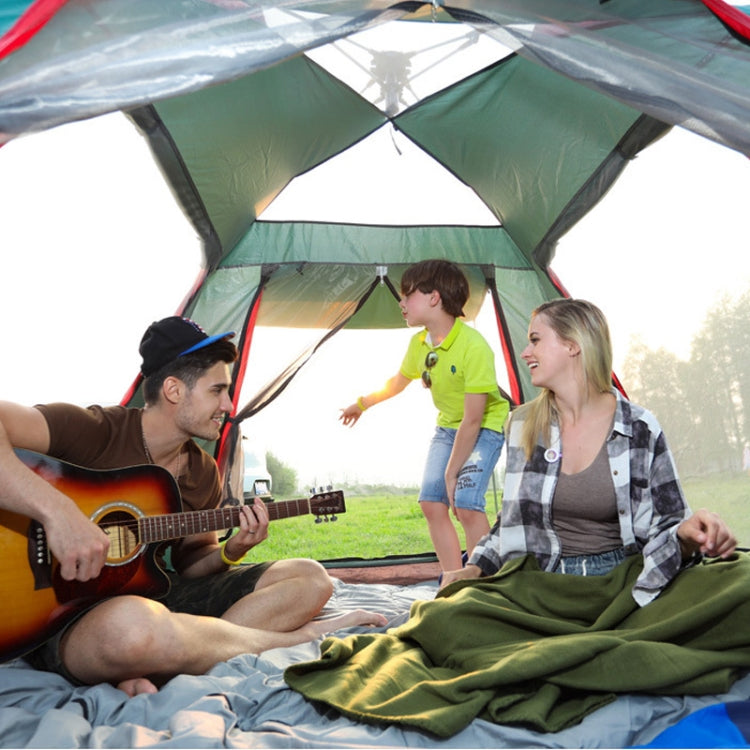 Open tent interior with gray floor and black mesh panels under blue rainfly