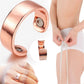 Glossy rose gold open cuff ring with magnetic disc accents, shown on a hand