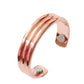 Rose gold open cuff ring side view with magnetic disc accent plates