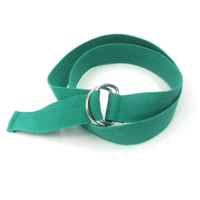 Unisex canvas waist belt in green with silver double-ring buckle and looped strap.