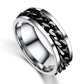 Polished stainless steel ring with black chain-link outer band and smooth inner band