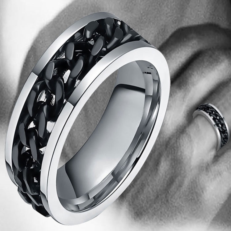 Black chain-link stainless steel ring with polished silver edges, angled close-up