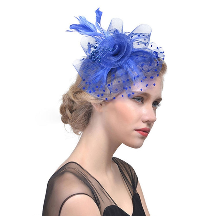 Blue mesh bridal fascinator with feather plume and beaded spiral flower