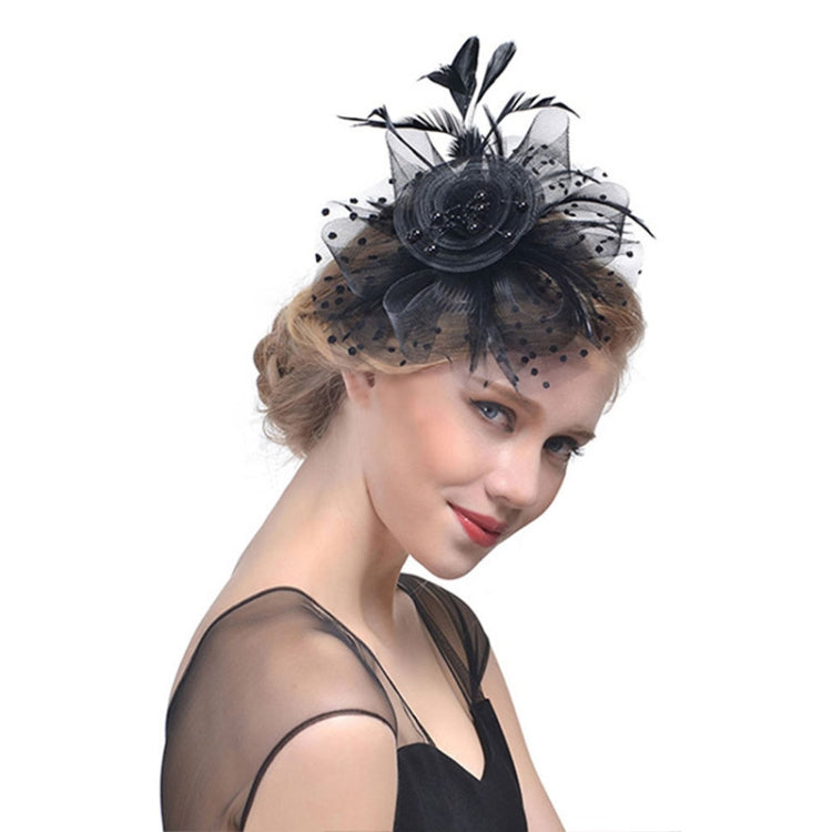 Black mesh bridal fascinator with feather accents and beaded center flower