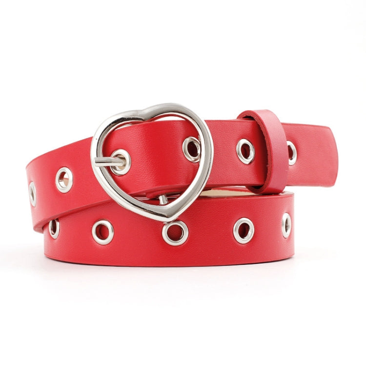Red narrow leather belt with silver heart buckle and round grommet studs
