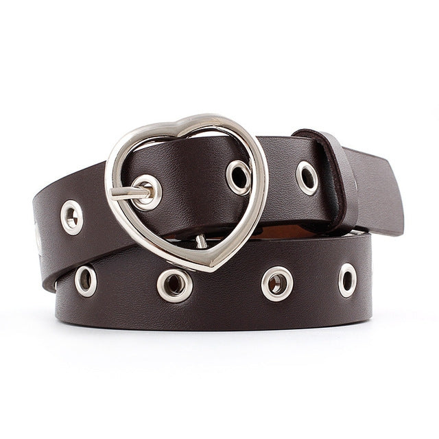 Dark brown narrow leather belt with silver heart buckle and round grommet studs