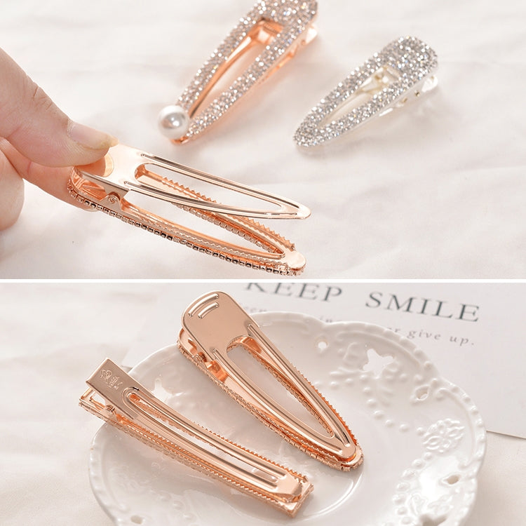 Crystal rhinestone barrette set with faux pearl accents in rose and silver tones