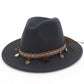 Dark gray felt wide-brim hat with patterned band and small dangling charm tassels