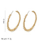 Gold-tone crystal hoop earrings, open teardrop shape, stud backs