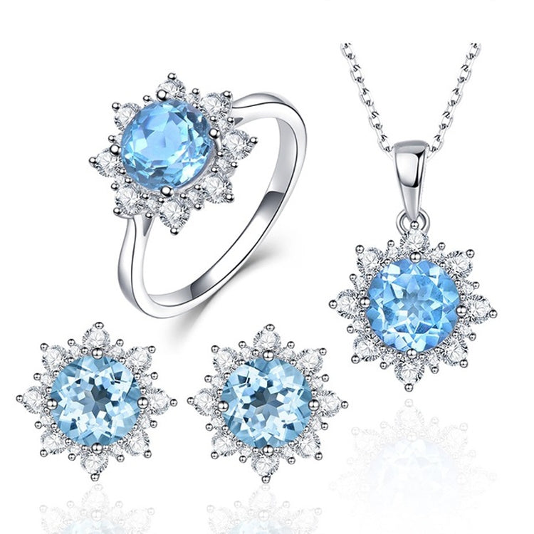 Sea blue gemstone ring, pendant necklace, and stud earring trio in silver tone.