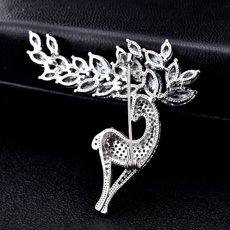 Silver crystal deer brooch with open body design and leaf crown antlers