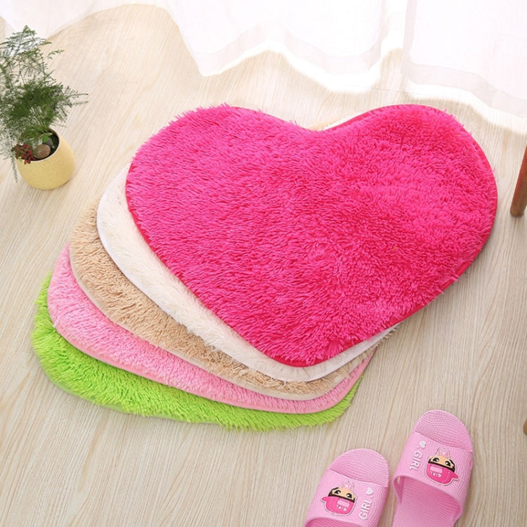 Heart-shaped bath mat, pink plush with white rim and non-slip backing