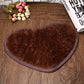 Heart-shaped non-slip bath mat, coffee brown with textured fuzzy pile and stitched edge