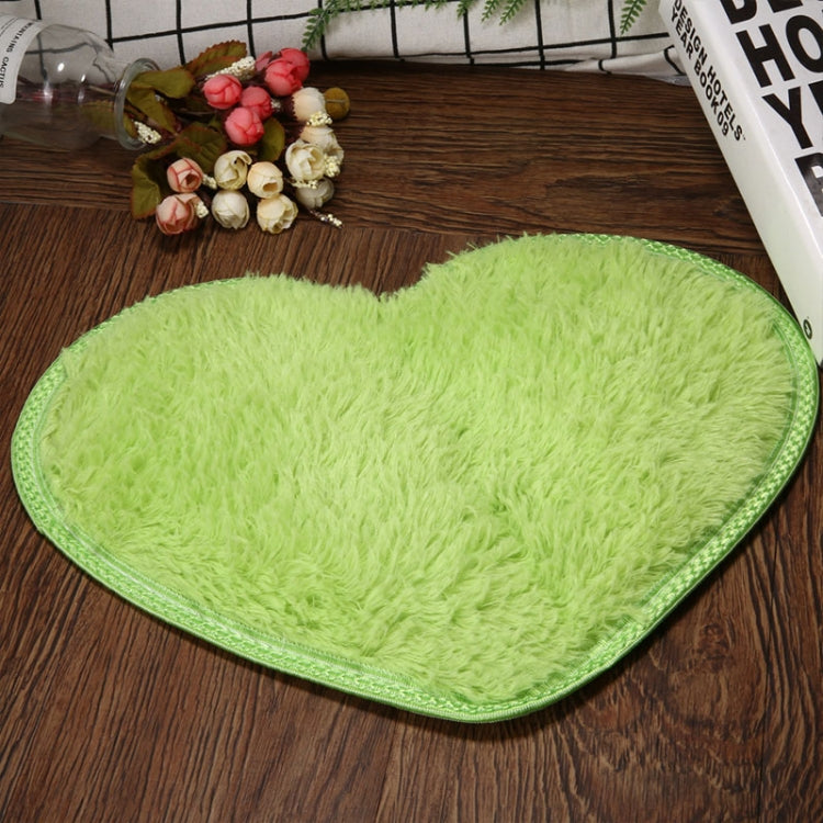 Heart-shaped non-slip bath mat, light green with textured fuzzy pile and edge trim