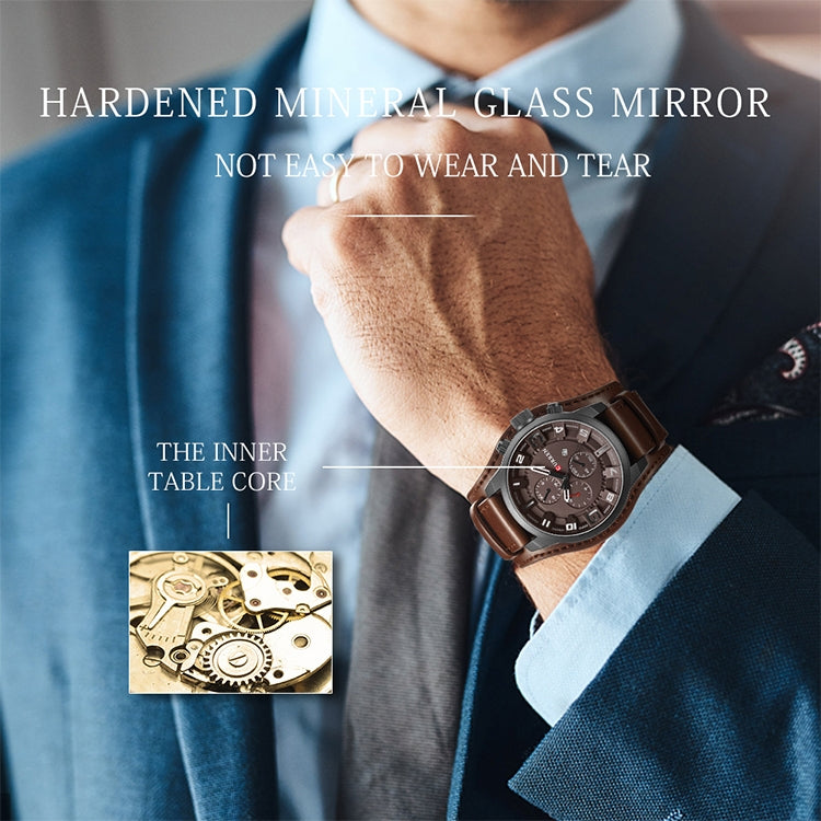 Men's quartz watch with dark dial and brown leather strap, worn on wrist.