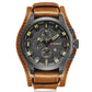Men's quartz watch with brown leather band and black dial, yellow numerals and subdials.
