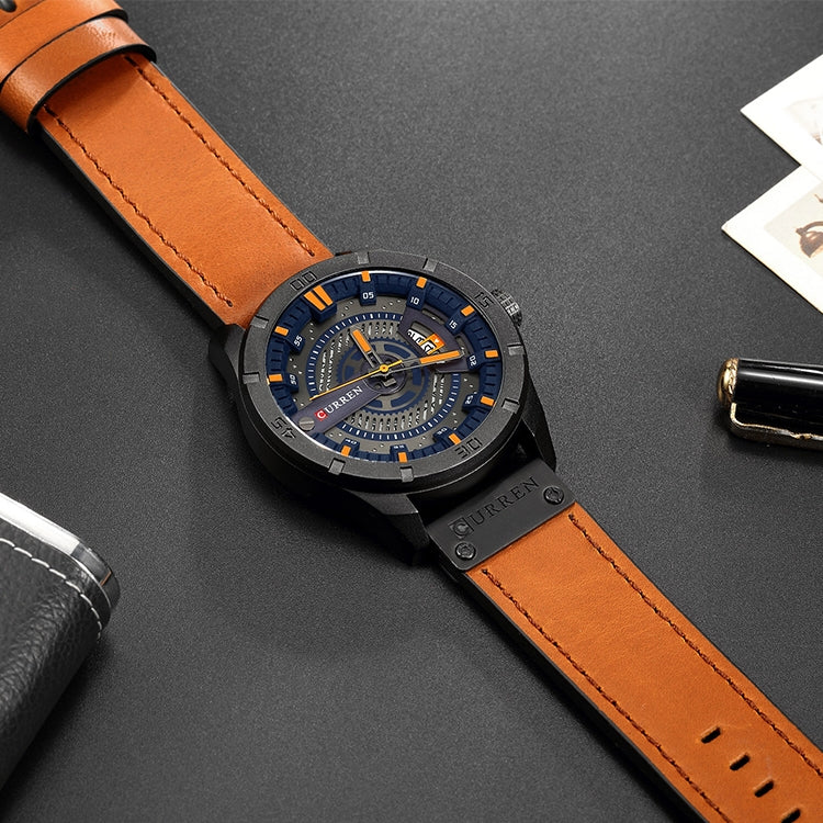 Men's military sports quartz watch on dark surface, black case with blue dial, orange leather strap