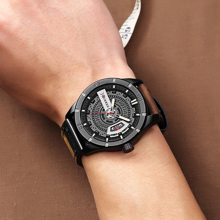 Men's military sports quartz watch on wrist, black case with white dial, black leather strap