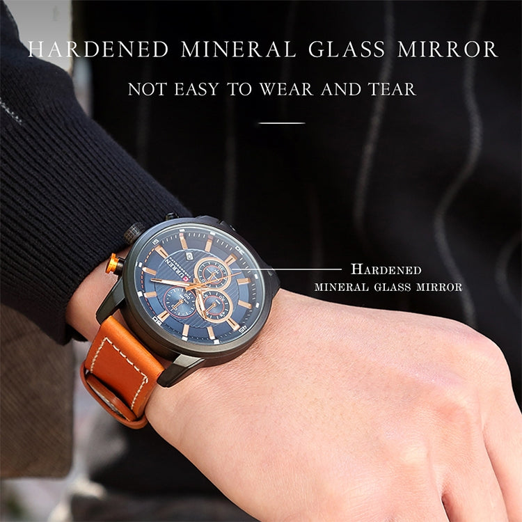 Men’s chronograph wristwatch with blue dial, black case, and tan leather strap