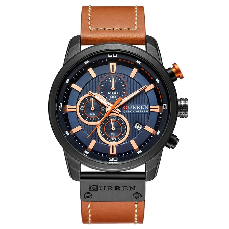 Men’s chronograph wristwatch with blue dial accents, black case, and tan leather strap